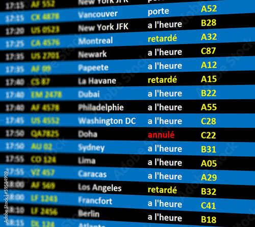 écran départs aéroport bleu en français