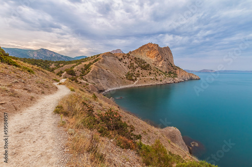 sunset on the sea and mountain view