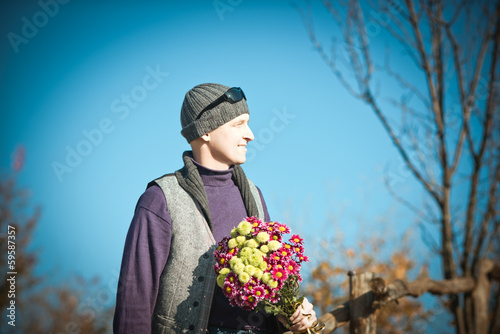 man with flowers photo