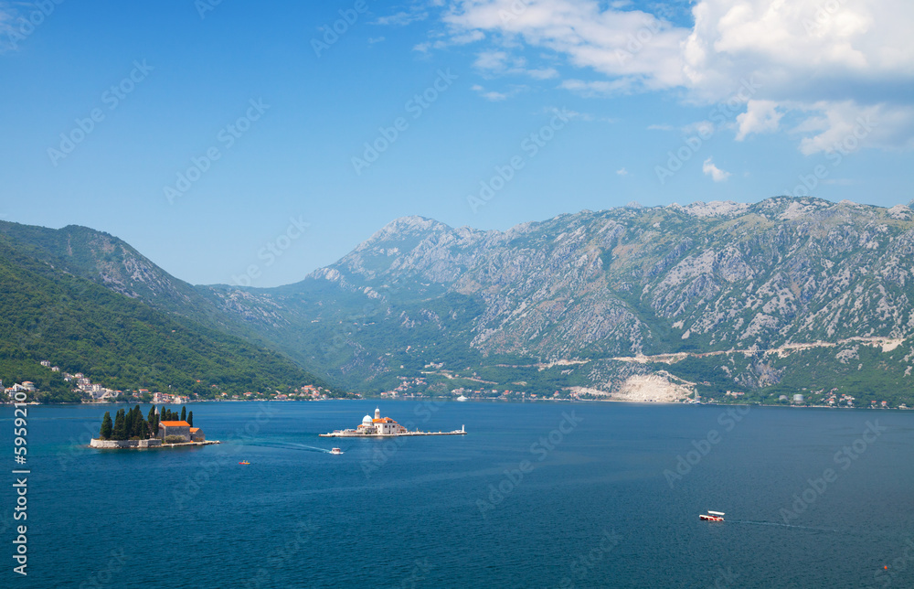 Bay of Kotor landscape with small islands and boats