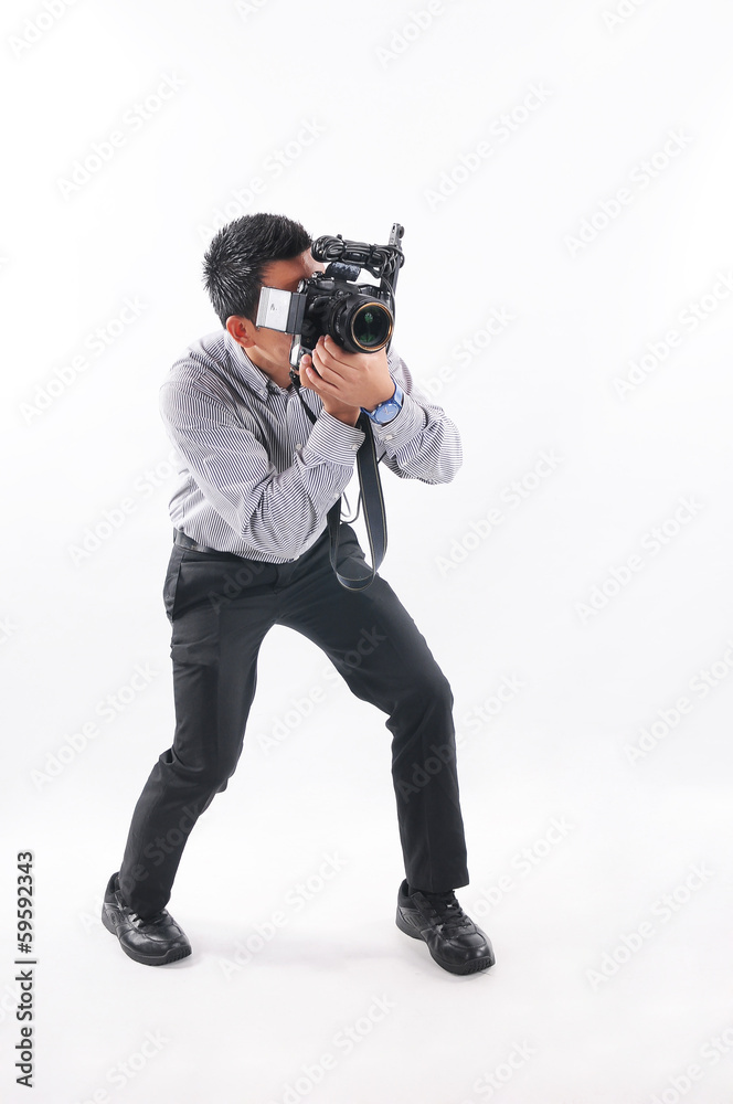 Professional male photographer taking picture, white background Professional male photographer taking picture, white background