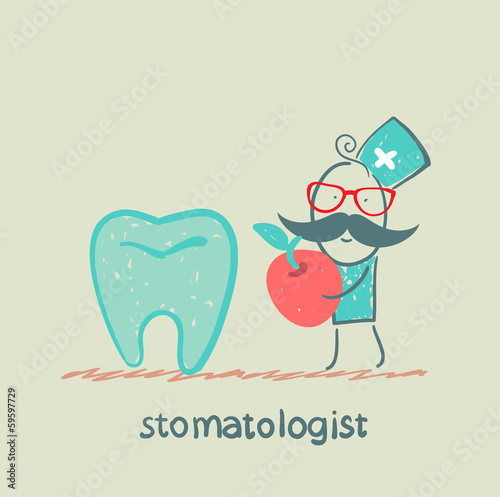 stomatologist    with apple standing near a large tooth