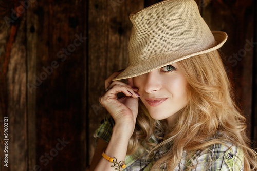 Portrait of Blonde Woman with Hat