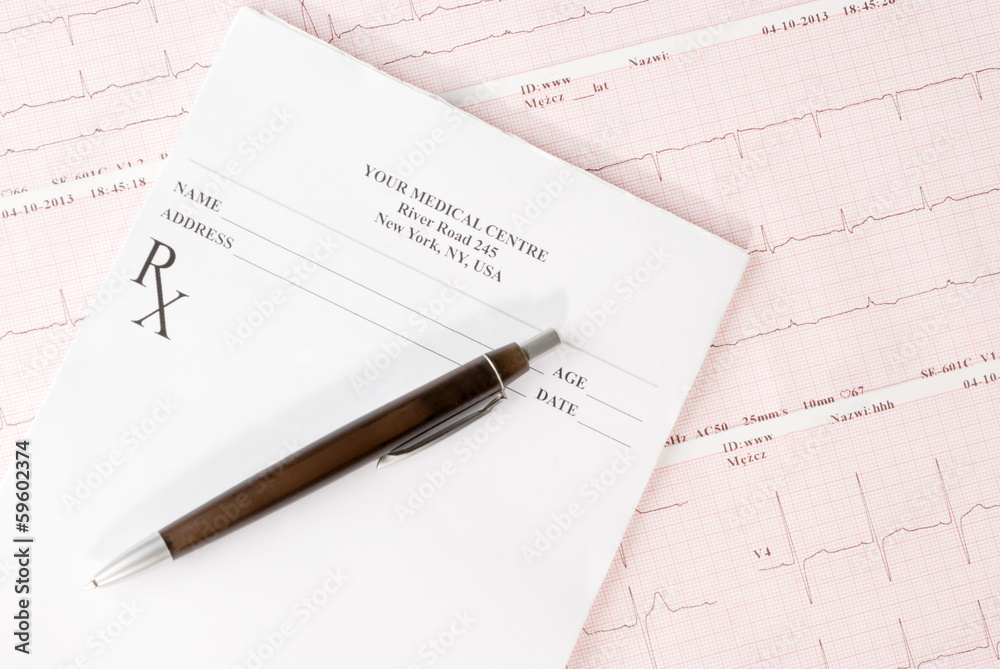Empty medical prescription on electrocardiogram (ECG) chart Empty medical prescription on electrocardiogram (ECG) chart