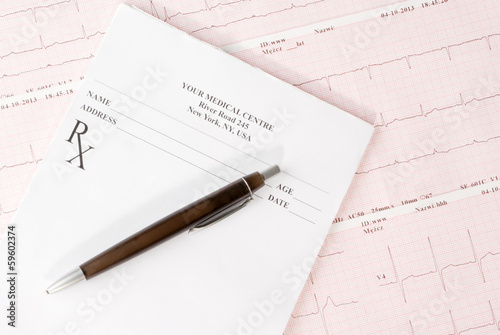 Empty medical prescription on electrocardiogram (ECG) chart