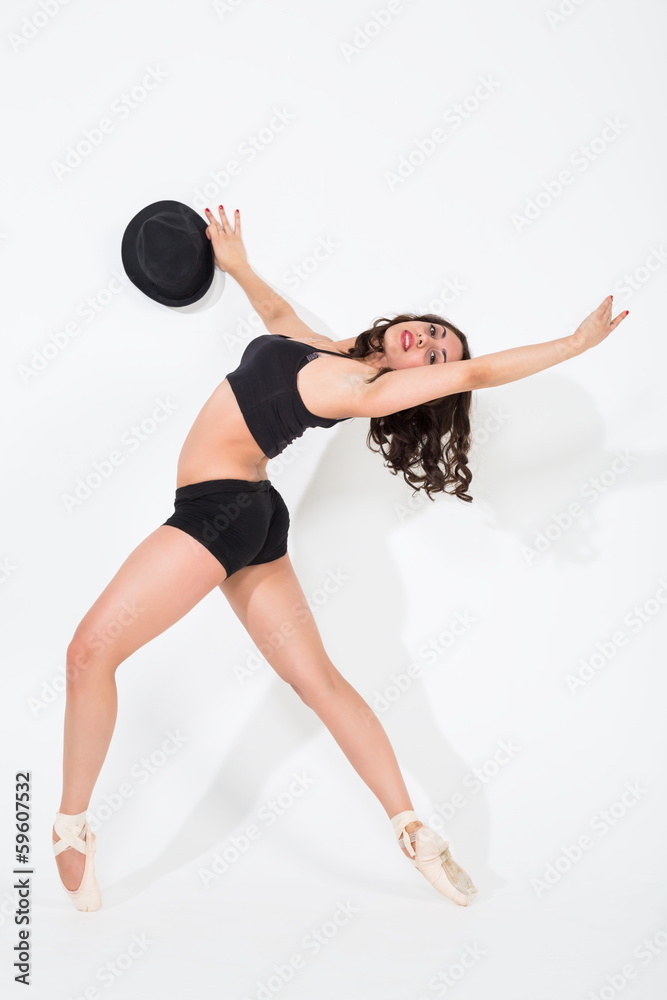 girl in ballet shoes and sport dress is engaged in gymnastics girl in ballet shoes and sport dress is engaged in gymnastics