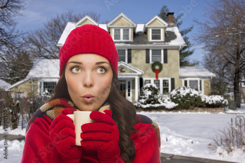 Woman in Winter Clothing Ho...
