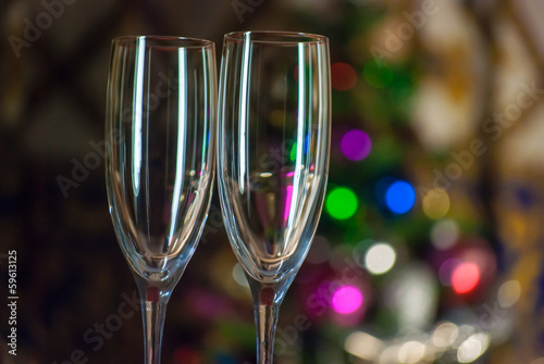 glasses with defocused christmas tree in background photo