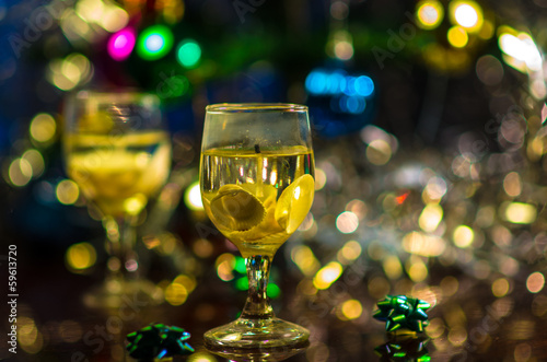 cndle in form of wine glass with seashells photo
