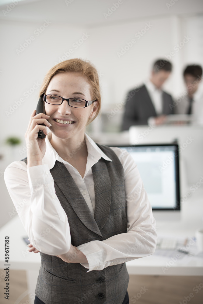 portrait of smiling businesswoman at phone portrait of smiling businesswoman at phone