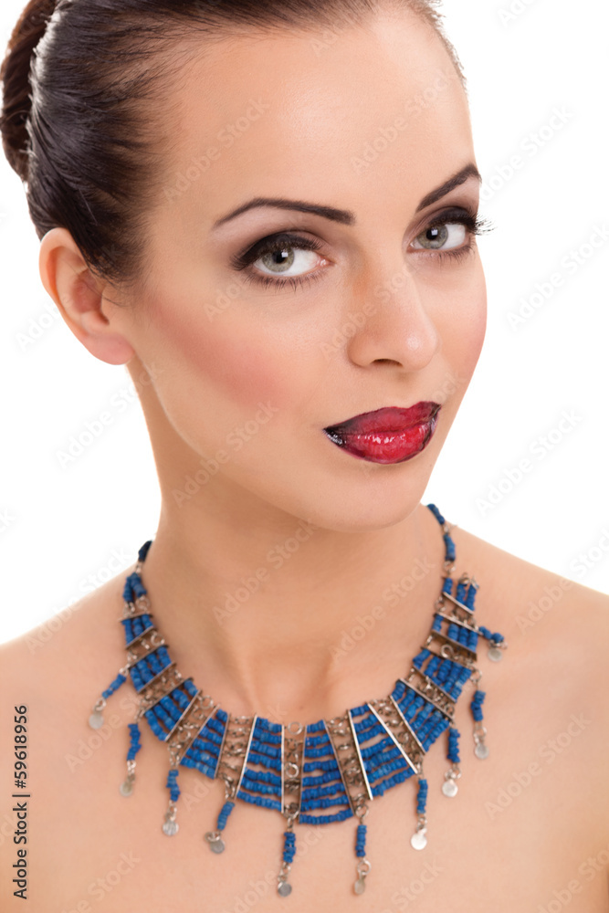 young  beautiful woman wearing blue necklace