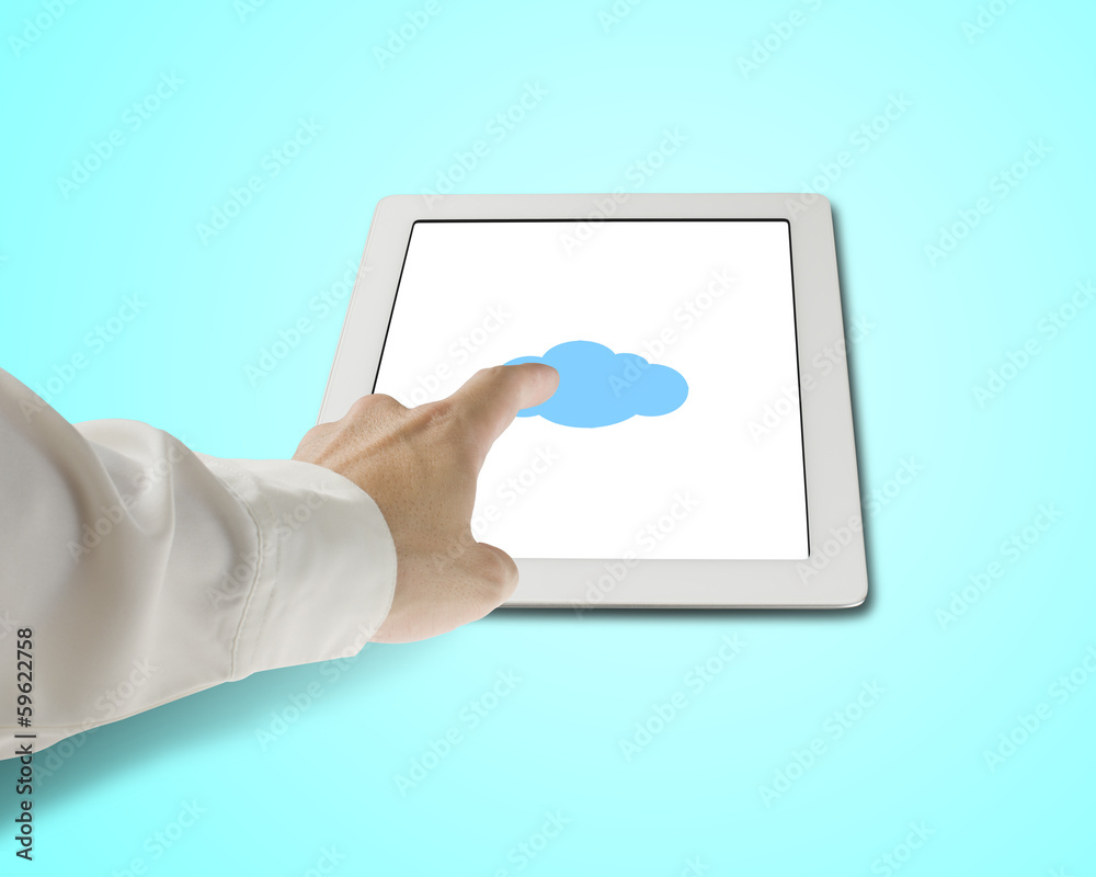 Hand touching cloud shape icon on tablet in green background Hand touching cloud shape icon on tablet in green background