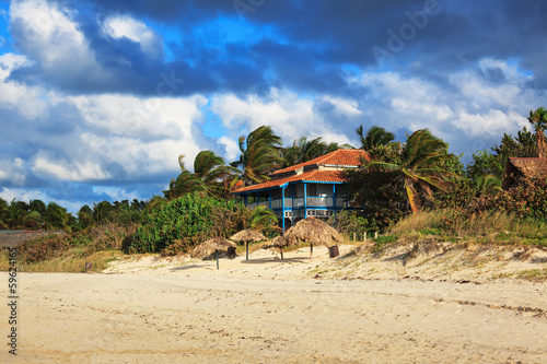 house on the sandy beach © terex