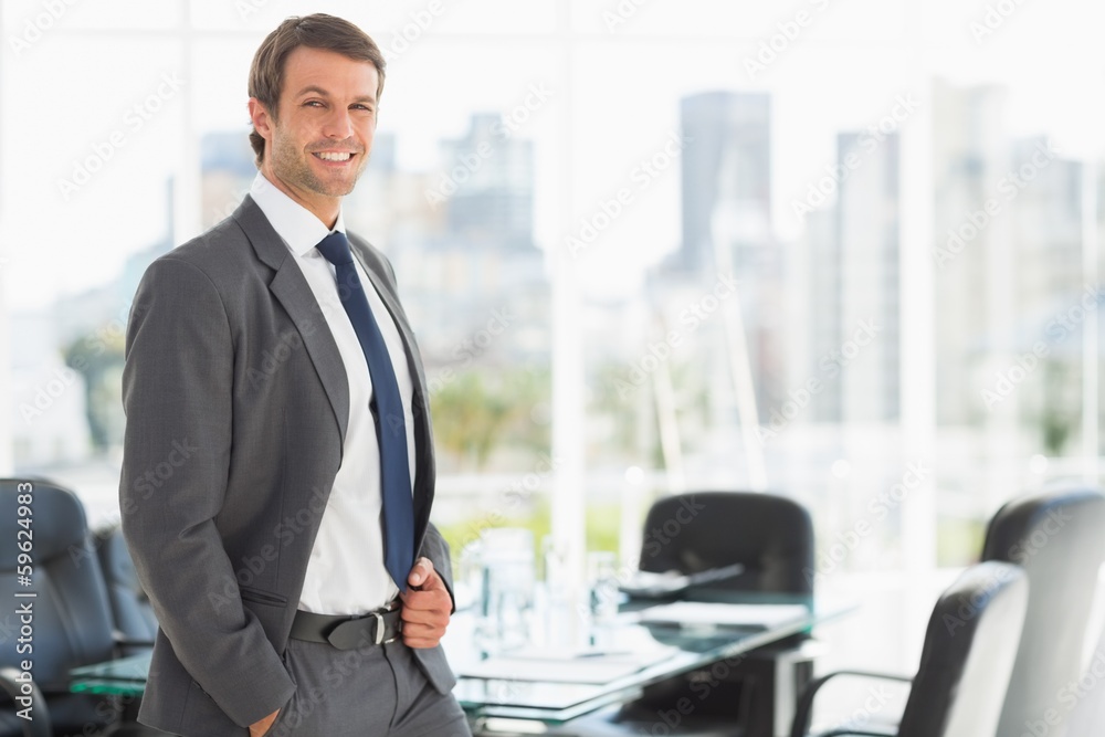 Handsome young businessman in office Handsome young businessman in office