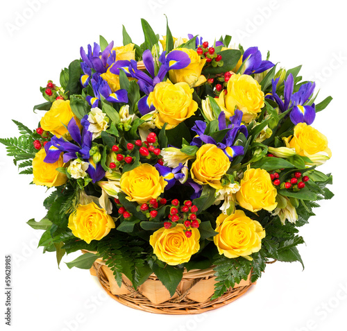 Bouquet of yellow rose and blue irise flower in basket isolated on white background