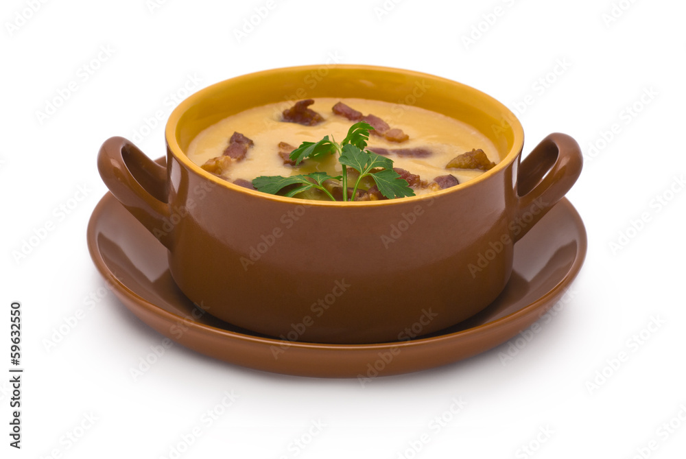 Pea Cream-Soup with Grilled Bacon isolated on white Pea Cream-Soup with Grilled Bacon isolated on white
