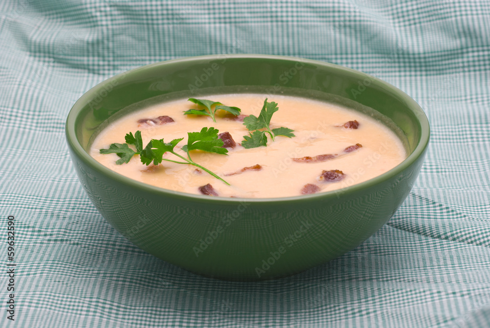 Pea Cream-Soup with Grilled Bacon on Green Tartan Cloth Pea Cream-Soup with Grilled Bacon on Green Tartan Cloth