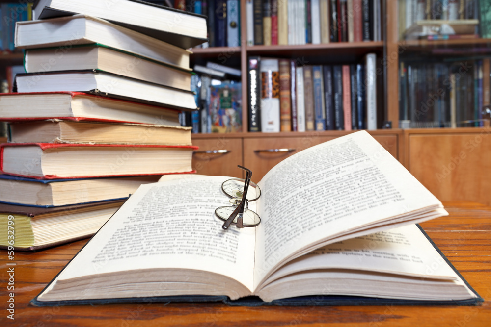 open books on wooden table open books on wooden table