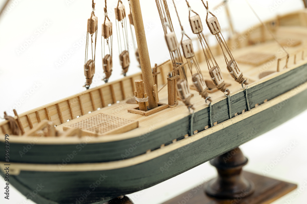  part of model of the ship made of a tree. photographed by a close up