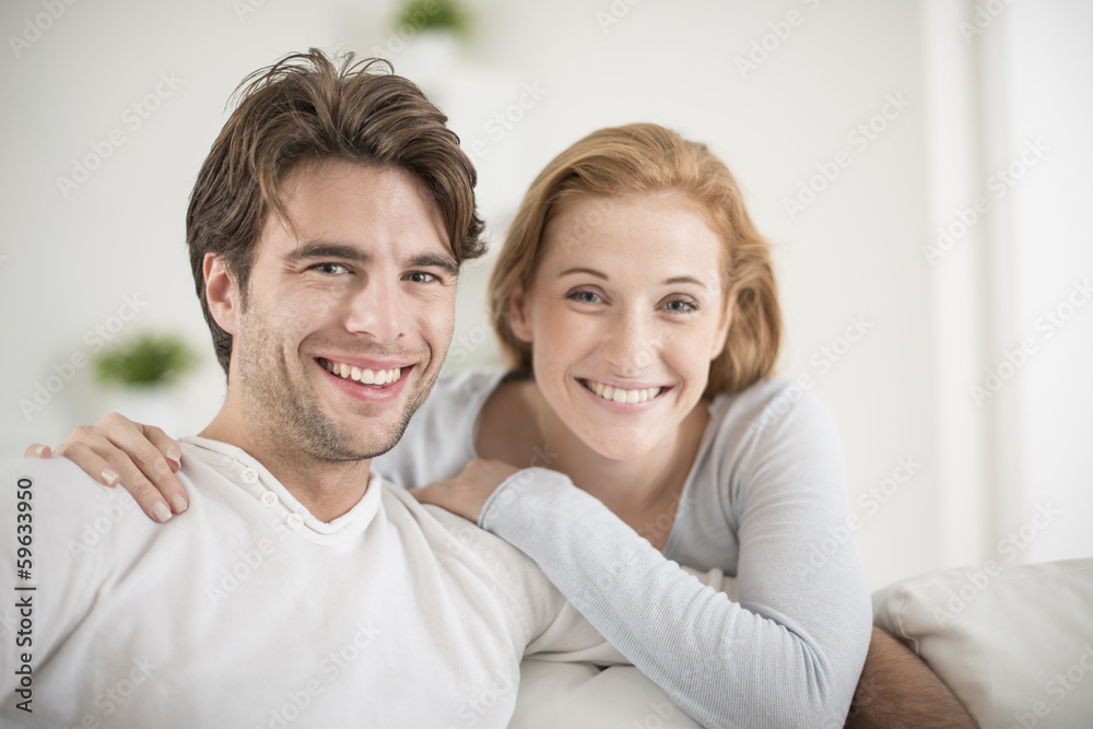 portrait of a cheerful couple at home