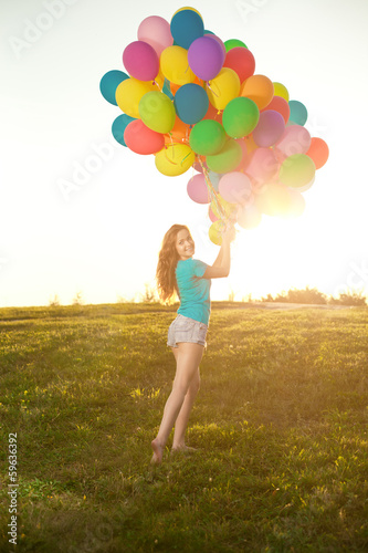 sunny and positive energy of nature. Young beautiful girl on the