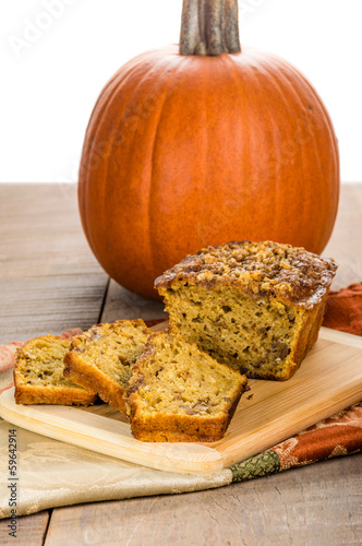 Pumplin walnut bread on cutting board photo