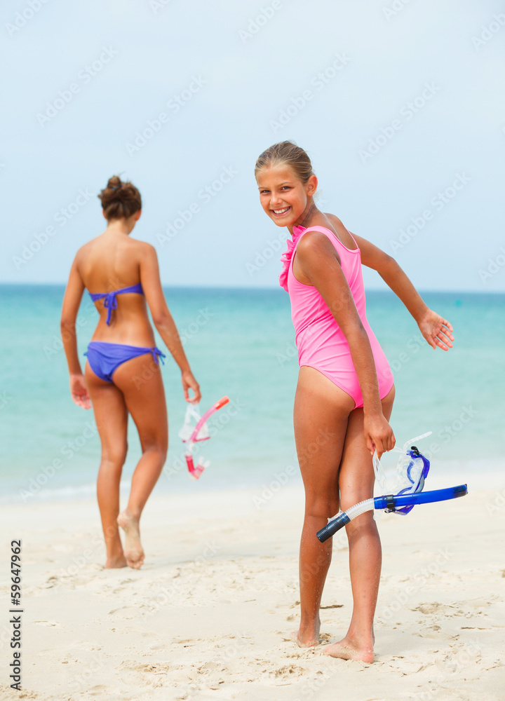 Hhappy girls on beach
