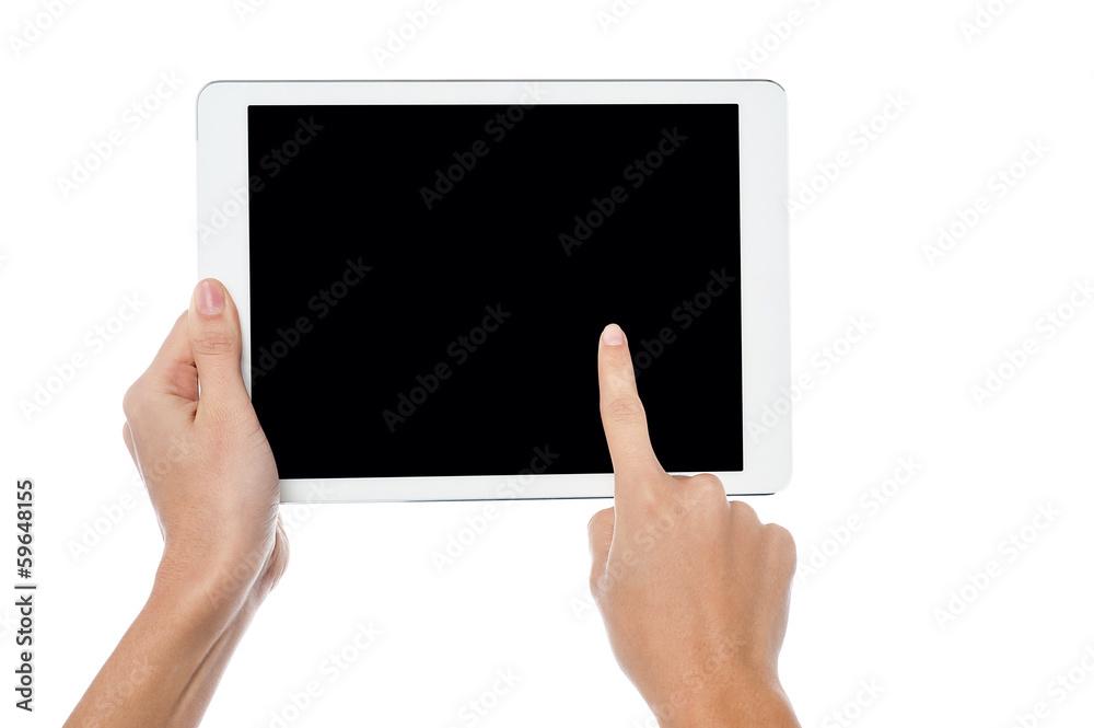 Finger being pointed on tablet screen Finger being pointed on tablet screen