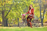 Young female on a bicycle in a park