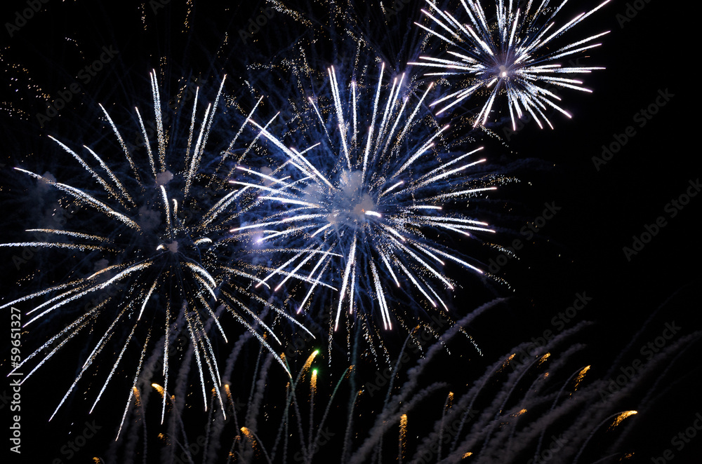 Blue fireworks exploding in night sky Blue fireworks exploding in night sky