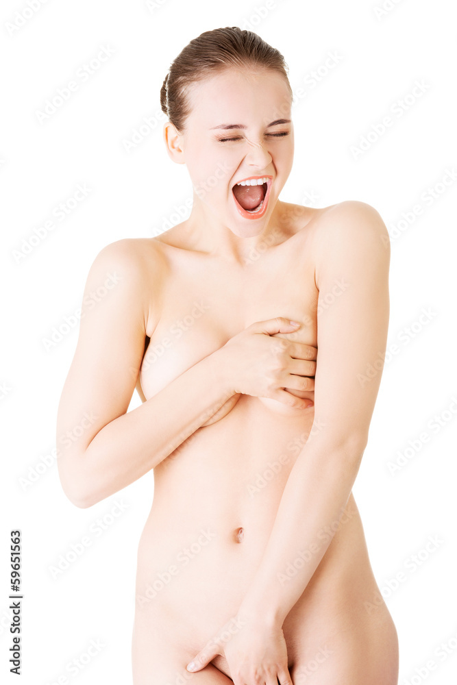Fototapeta premium Beautiful naked woman covering herself and shouting.