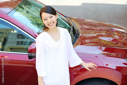 Fototapeta 女性・車