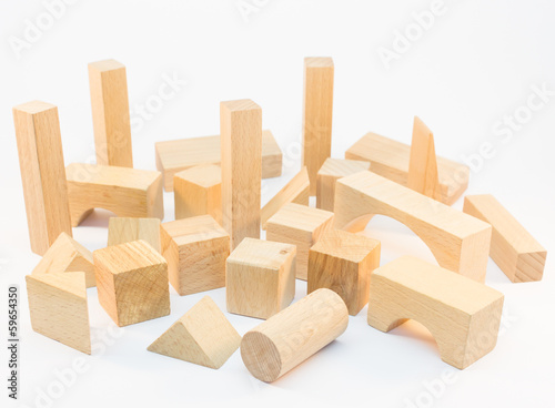 Wooden building blocks on white background
