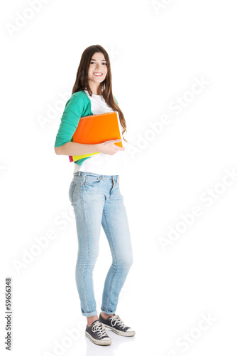 Young beautiful student with files, workbook.