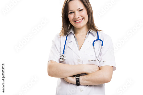 Beautiful young doctor  isolated over white background