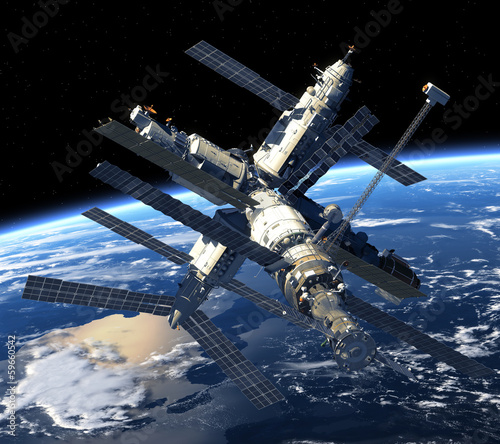 Fototapeta Naklejka Na Ścianę i Meble -  Space Station Orbiting Earth