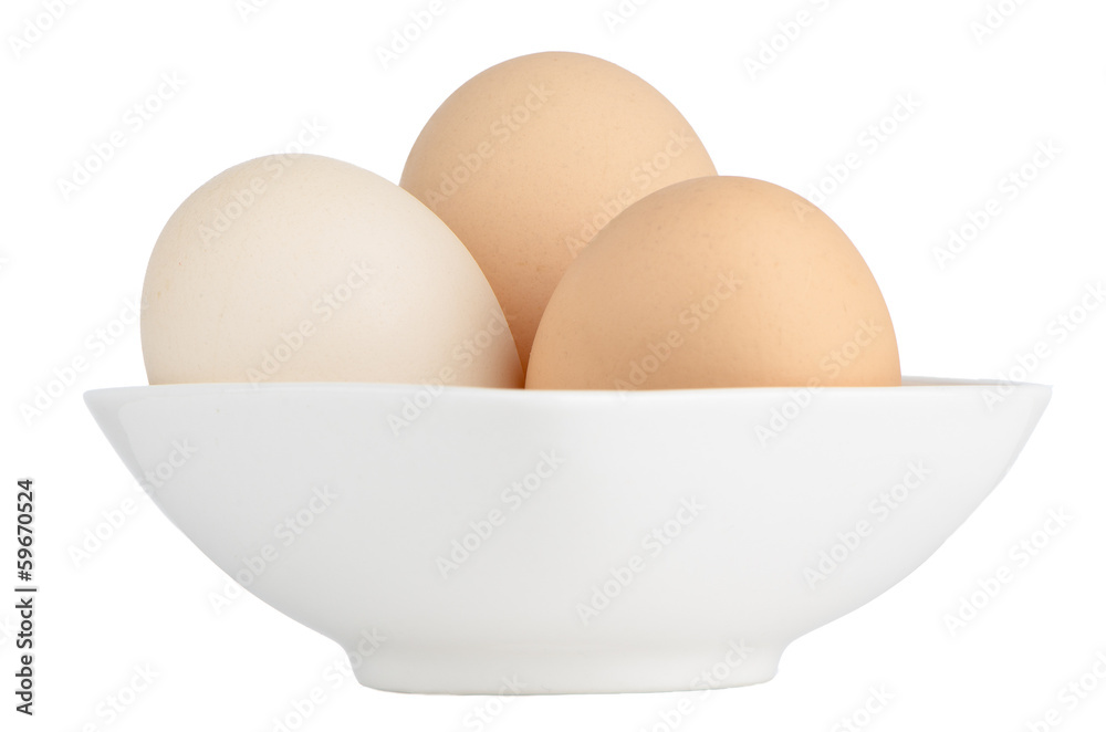 Brown eggs in white ceramic bowl Brown eggs in white ceramic bowl