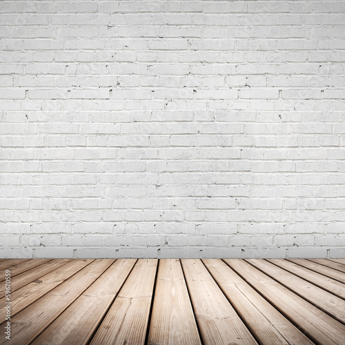 Abstract interior with wooden floor and white brick wall