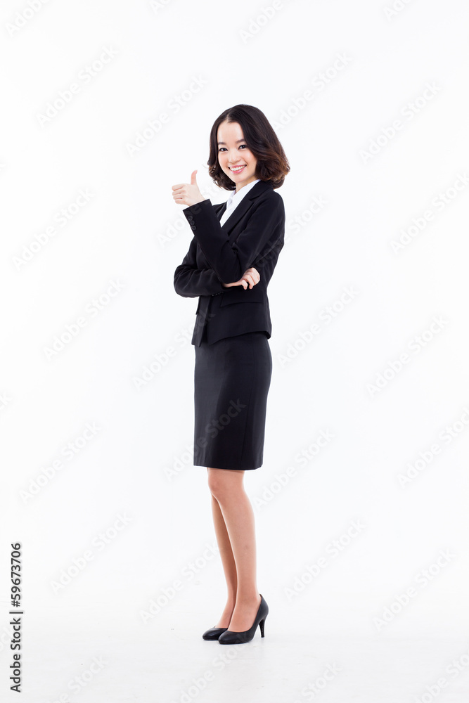 Successful happy Asian businesswoman showing thumb. Successful happy Asian businesswoman showing thumb.