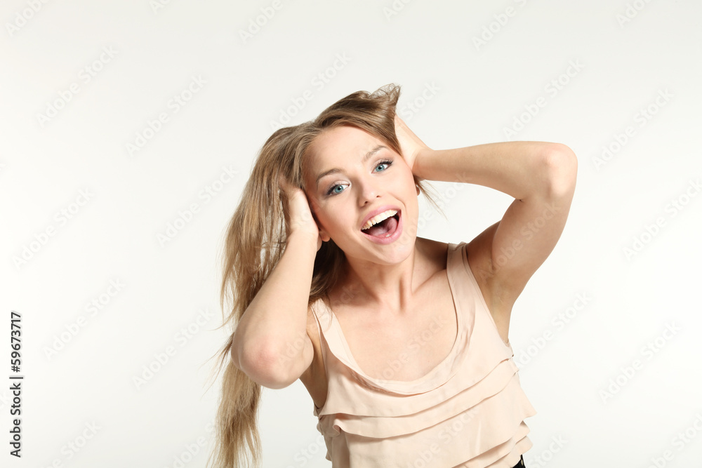 beautiful girl cheerful; portrait in studio beautiful girl cheerful; portrait in studio