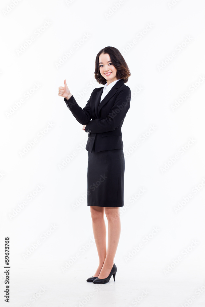 Successful happy Asian businesswoman showing thumb. Successful happy Asian businesswoman showing thumb.
