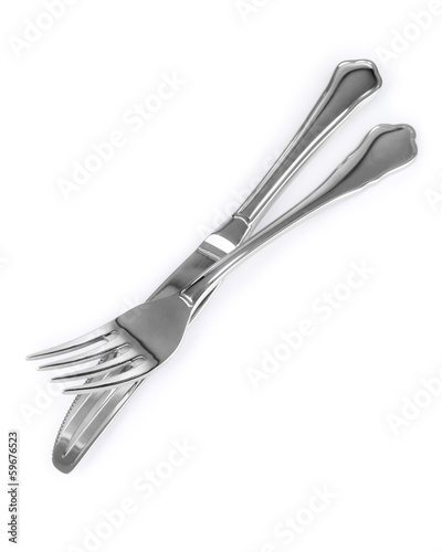 Knife and fork isolated on white background photo