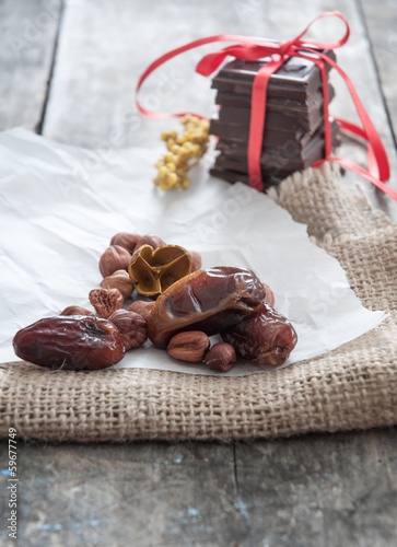 Delicious dates on wooden surface