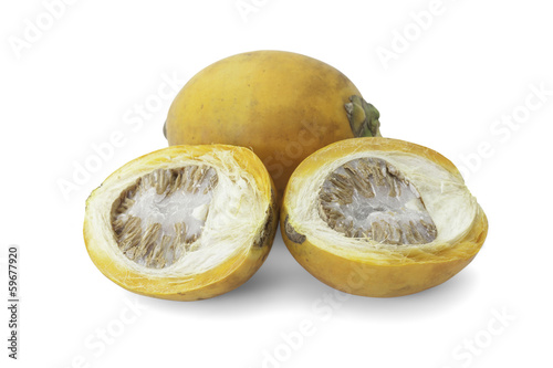 ripe acera or betel palm nut fruit with path photo