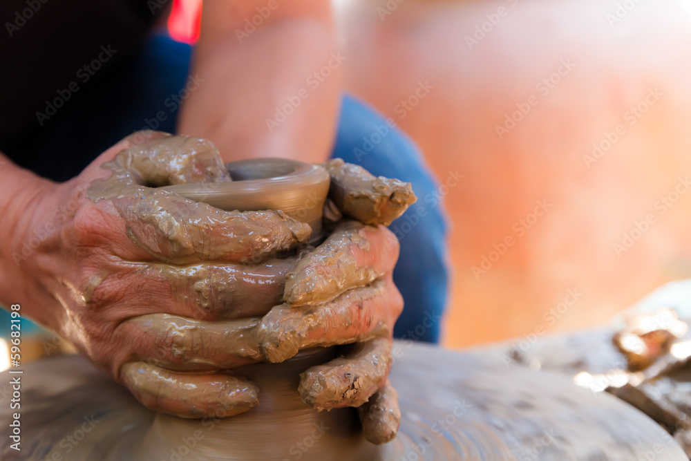 Hands made Thai traditional clay pottery in Koh Kret island, Tha