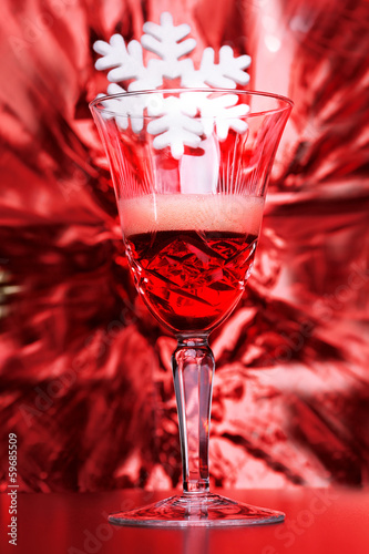 A glass of red wine with star photo