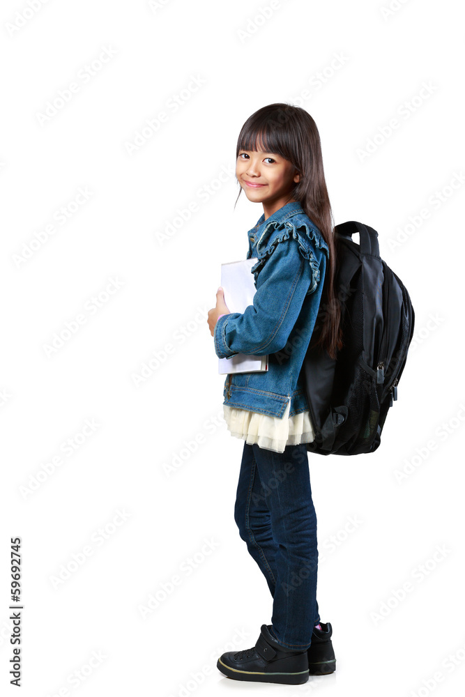 Little asian girl standing and holding books Little asian girl standing and holding books
