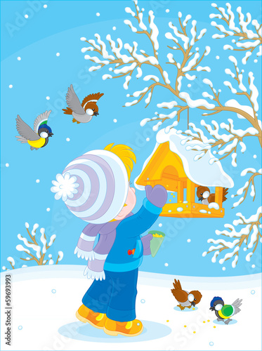 Child feeds birds