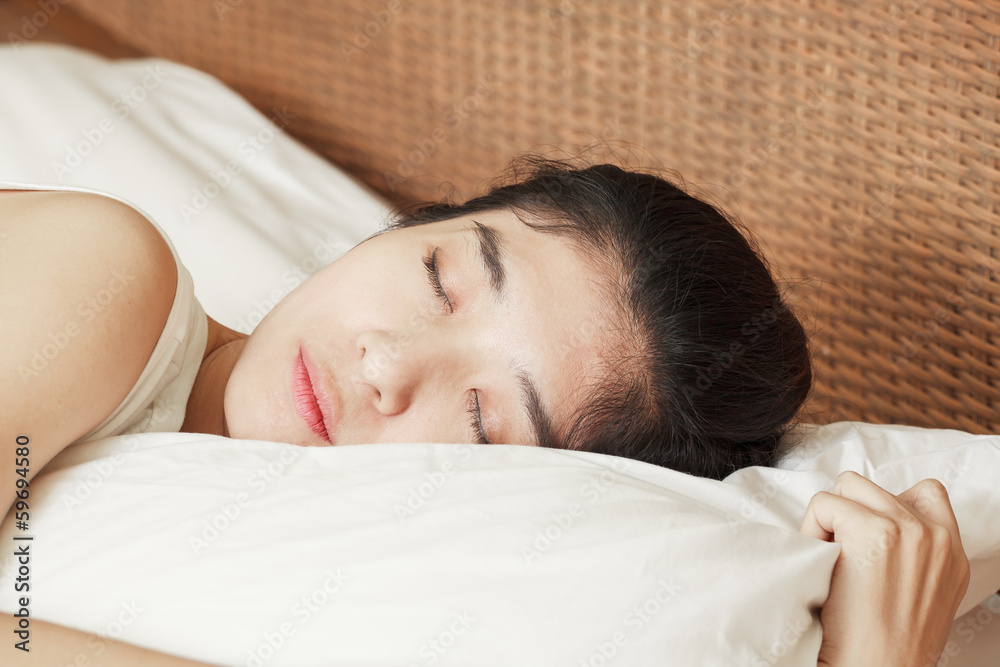young beautiful woman sleeping in bed young beautiful woman sleeping in bed