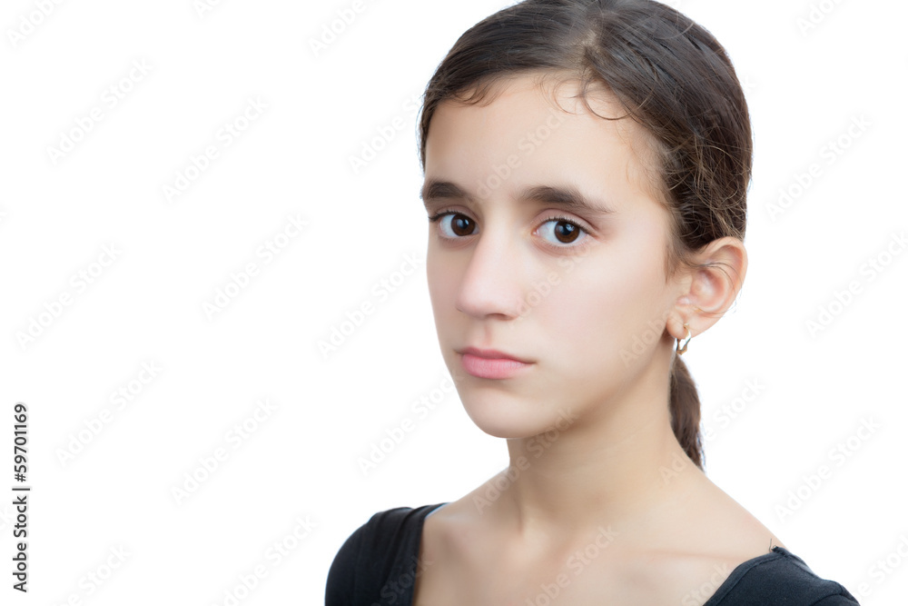 Serious hispanic teenager isolated on white Serious hispanic teenager isolated on white